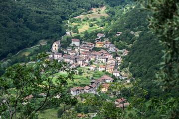 Fototapeta na wymiar An Italian little village hidden in a forest valley
