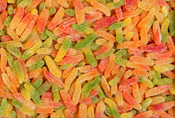 Colored jelly worms for background.
