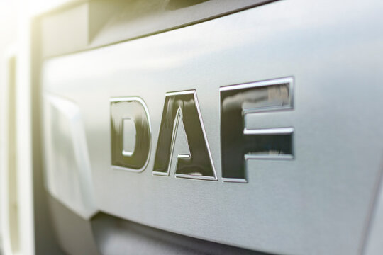 Minsk. Belarus. May 28, 2020. Street lighting. On the truck cab is the inscription Daf. Sun flare. Close-up.