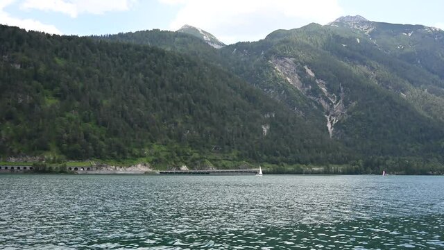 lake achen surrounded by mountains austria