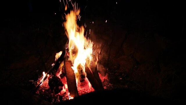 fire in the fireplace by night