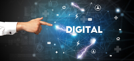 Hand pointing at DIGITAL inscription, modern technology concept