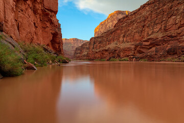 Fototapeta na wymiar Colorado River And Cliff Walls In Grand Canyon National Park