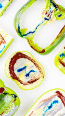 Collection of green vegetables and fruits on a white background. Vegetable pattern of green vegetables. Bell peppers, tomatoes, cucumber, cabbage, zucchini and apple in dyes