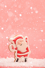 Santa Claus gingerbread on the pink background