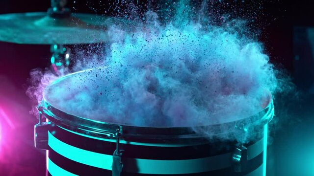Super Slow Motion Shot of Drum Hit with Color Powder Explosion at 1000 fps.