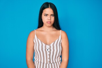 Obraz premium Young beautiful asian girl wearing casual clothes skeptic and nervous, frowning upset because of problem. negative person.