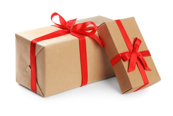 Christmas gift boxes decorated with red bows on white background
