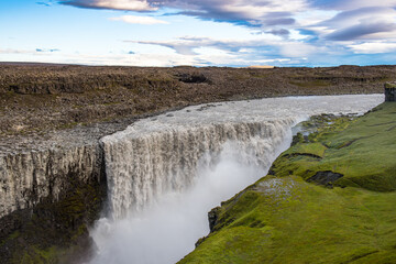 Fototapeta na wymiar Dettifoss waterfall in Jokulsa a Fjollum river in the highlands of north Iceland