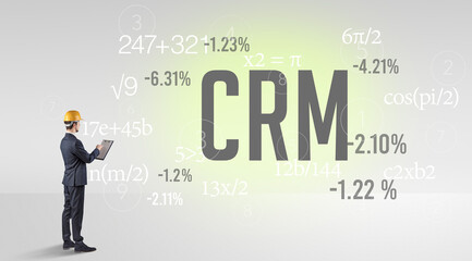 Technology Engineer in hard hat with CRM abbreviation