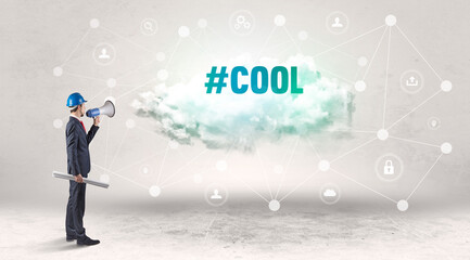 Engineer working on a social media concept with #COOL inscription