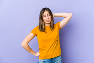 Young caucasian woman tired and very sleepy keeping hand on head.