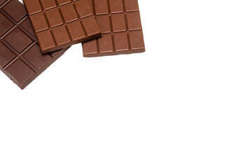 dark chocolate Tiles in the corner on a white background isolate