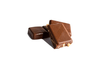 Three pieces of milk chocolate with nuts on a white background isolate