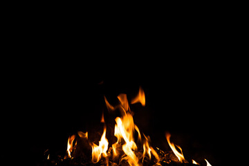 Fire flames on black background. fire burst texture for banner backdrop.