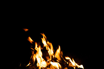 Fire flames on black background. fire burst texture for banner backdrop.