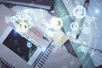 Multi exposure of forex graph hologram over desktop with phone. Top view. Mobile trade platform...