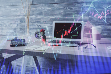 Double exposure of financial graph drawing and office interior background. Concept of stock market.