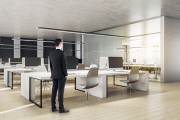 Businessman walking in office room