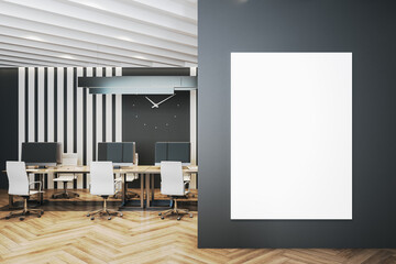 Luxury coworking office interior with blank poster on wall