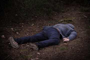 A caucasian man's dead body was found in the park. Murder in the woods. Murdered citizen. Crime...