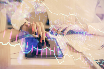 Double exposure of forex chart sketch hologram and woman holding and using a mobile device. Financial market concept.