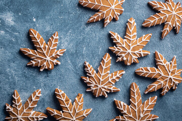 Cannabis gingerbread cookies overhead with white icing. 