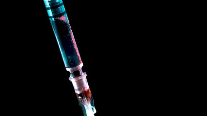 Taking blood with a syringe. Addict's infected blood