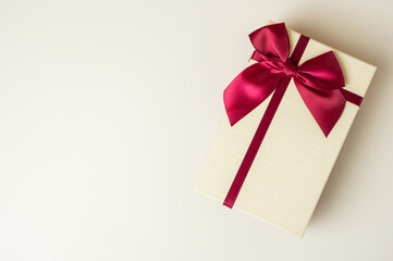 Gift box mockup on the white table with copy space. Merry christmas and happy new years background for text advertise.