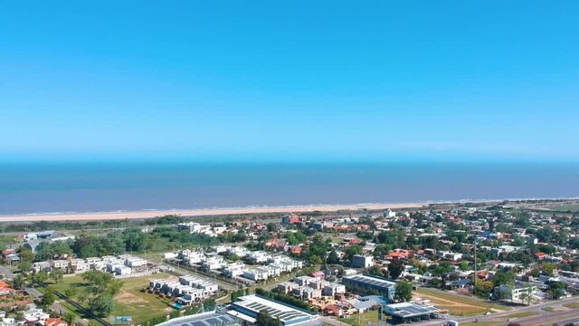 settlement along the blue coastline beach