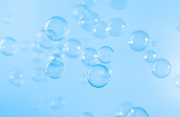 Abstract, Blue soap bubbles floating in the air. Natural freshness summer holiday background.