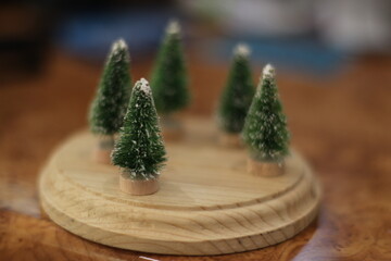 Christmas trees on a pedestal with blurred background