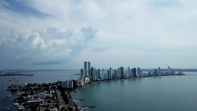 Steady footage from high above old fort and City Sky Line of Cartagena port in Colombia done by drone.