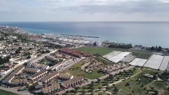 Shore, houses and agriculture. Aerial view. Axarqu&iacute;a, Malaga, Spain