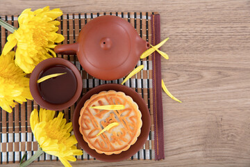 Moon cakes, tea and golden chrysanthemums for the Chinese Mid-Autumn Festival