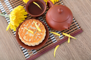 Moon cakes, tea and golden chrysanthemums for the Chinese Mid-Autumn Festival