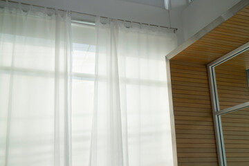 Soft curtain in modern white room