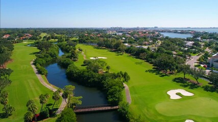 Flying over a opulent resort-style golfing community  in St. Petersburg, Florida
