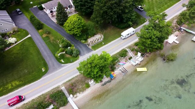 Mavic Mini Drone tracking Rv in shore area.