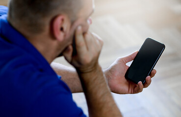 men using cell phone.hand holding texting message on screen mobile chatting friend ,search internet information sitting on sofa.technology device contact communication connecting people concept