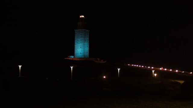 The Tower of H&eacute;cules illuminated in blue for the commemoration of world diabetes day