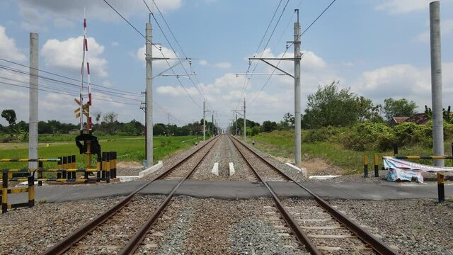 Aerial View of Train Rail with new electronic pole for KRL train in Yogyakarta, Indonesia