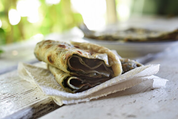 Slices of baked pied stuffed whit beet leafs-spinach and garlic/ Traditional Dalmatian cuisine/...