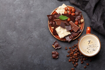 Various chocolate pieces, coffee and nuts