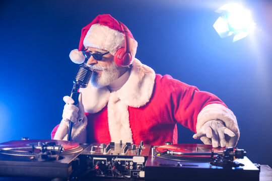 Cool Santa DJ Playing Music In Club