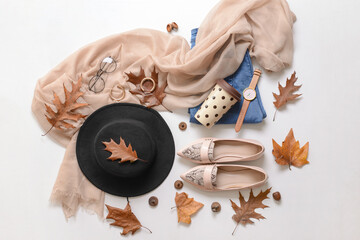 Autumn composition with stylish clothes on white background