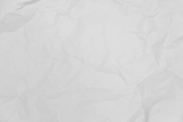 White crumpled paper texture background.
