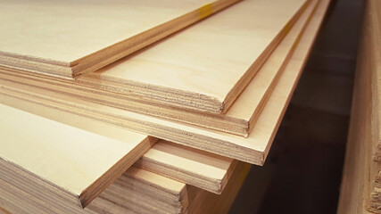 Close-up stack of plywood edges in the store