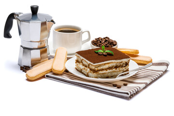 Traditional Italian Tiramisu dessert square portion on ceramic plate, mocha coffee maker, savoiardi cookies and cup of fresh espresso coffee isolated on white background with clipping path