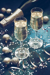 New years  celebration background with champagne bottle and glasses
